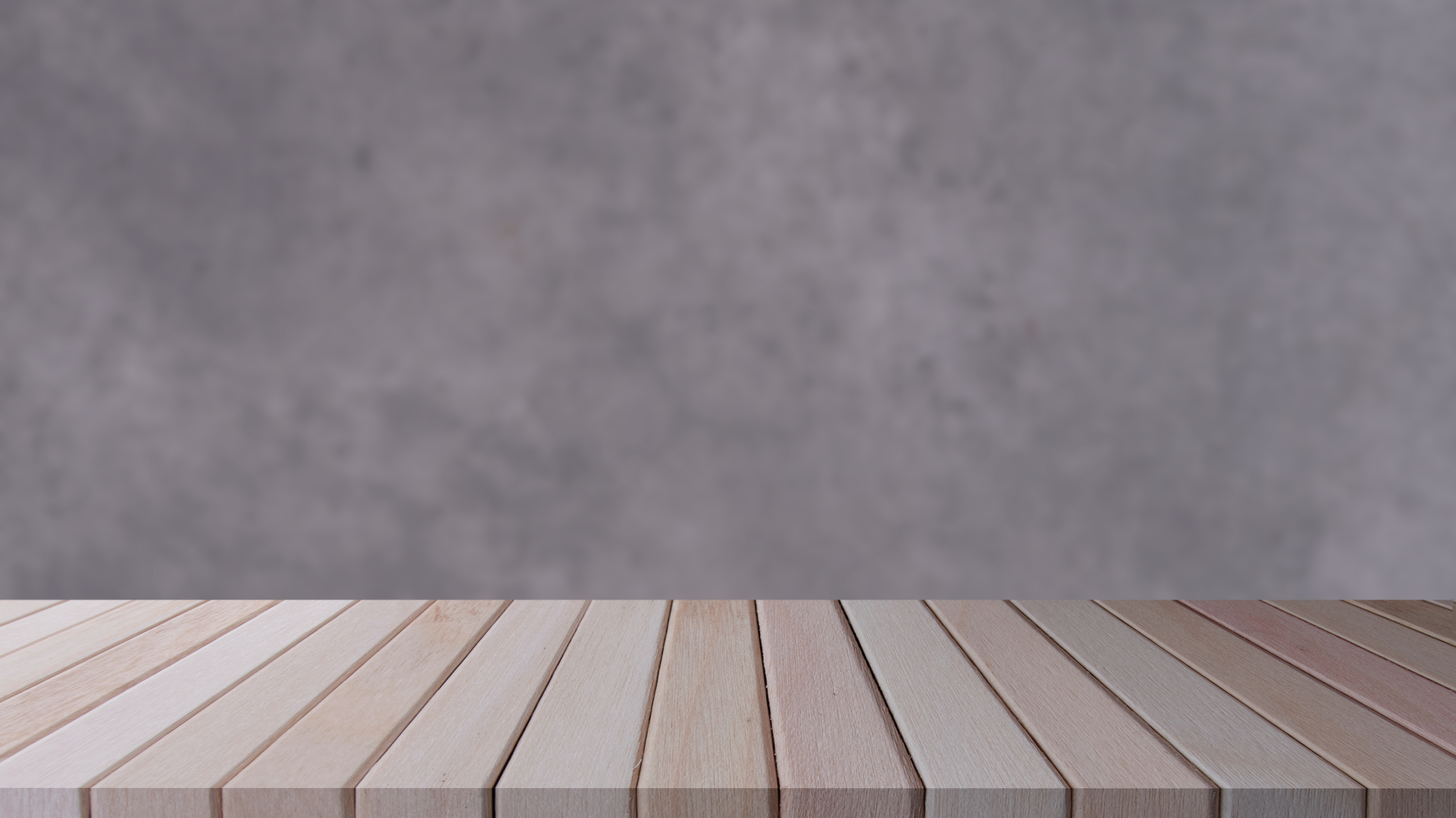 Wooden Table on Blurred Cement Background